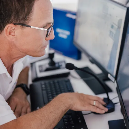 Push-to-talk intercom system in medical simulation environment